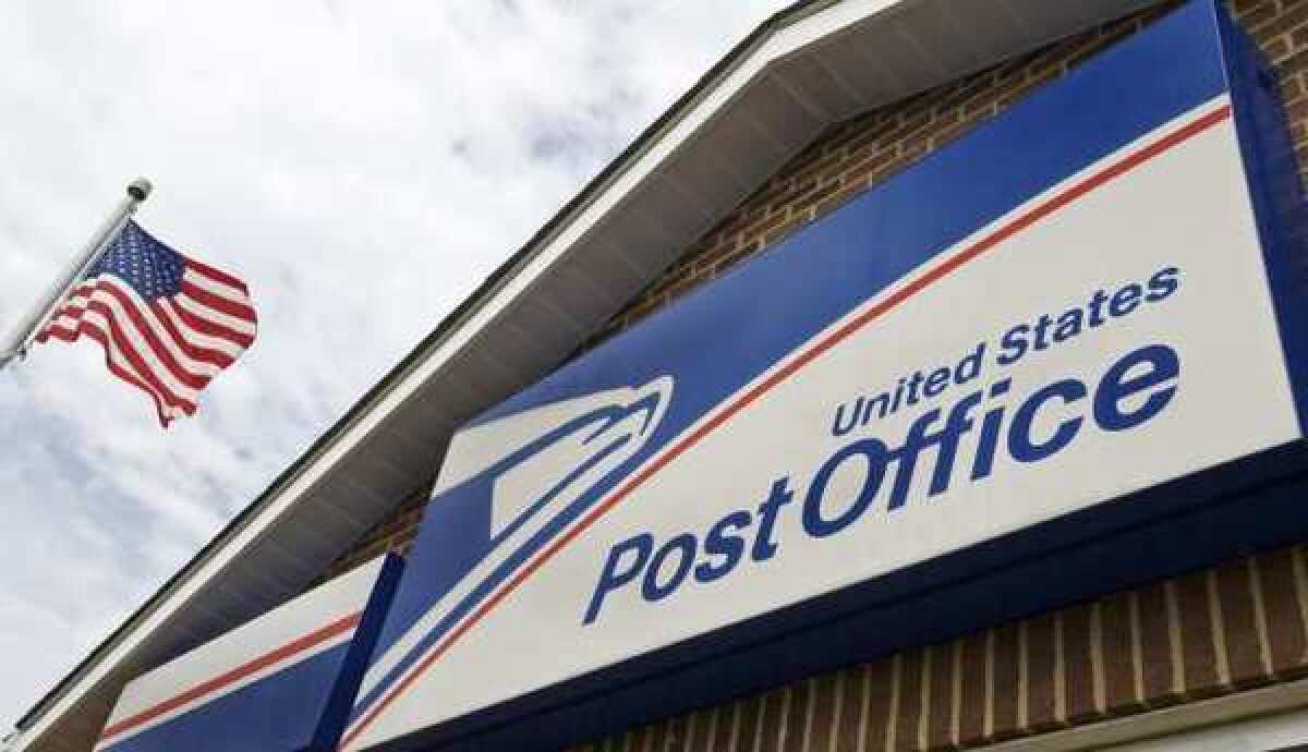 The U.S. post office in Bristow, Va. The USPS reported a $5.2-billion loss in its third quarter.