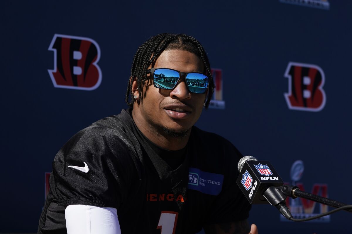 Cincinnati Bengals wide receiver Ja'Marr Chase answers questions during a press conference following the team's NFL football practice Friday, Feb. 11, 2022, in Los Angeles. The Cincinnati Bengals play the Los Angeles Rams in the Super Bowl Sunday Feb. 13. (AP Photo/Marcio Jose Sanchez)