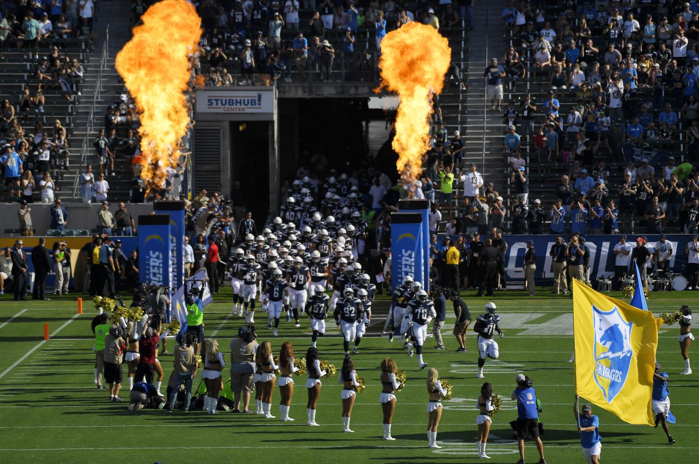 The Los Angeles Chargers take the field at StubHub Center before a preseason NFL football game against the Seattle Seahawks Sunday, Aug. 13, 2017, in Carson, Calif. (AP Photo/Mark J. Terrill)