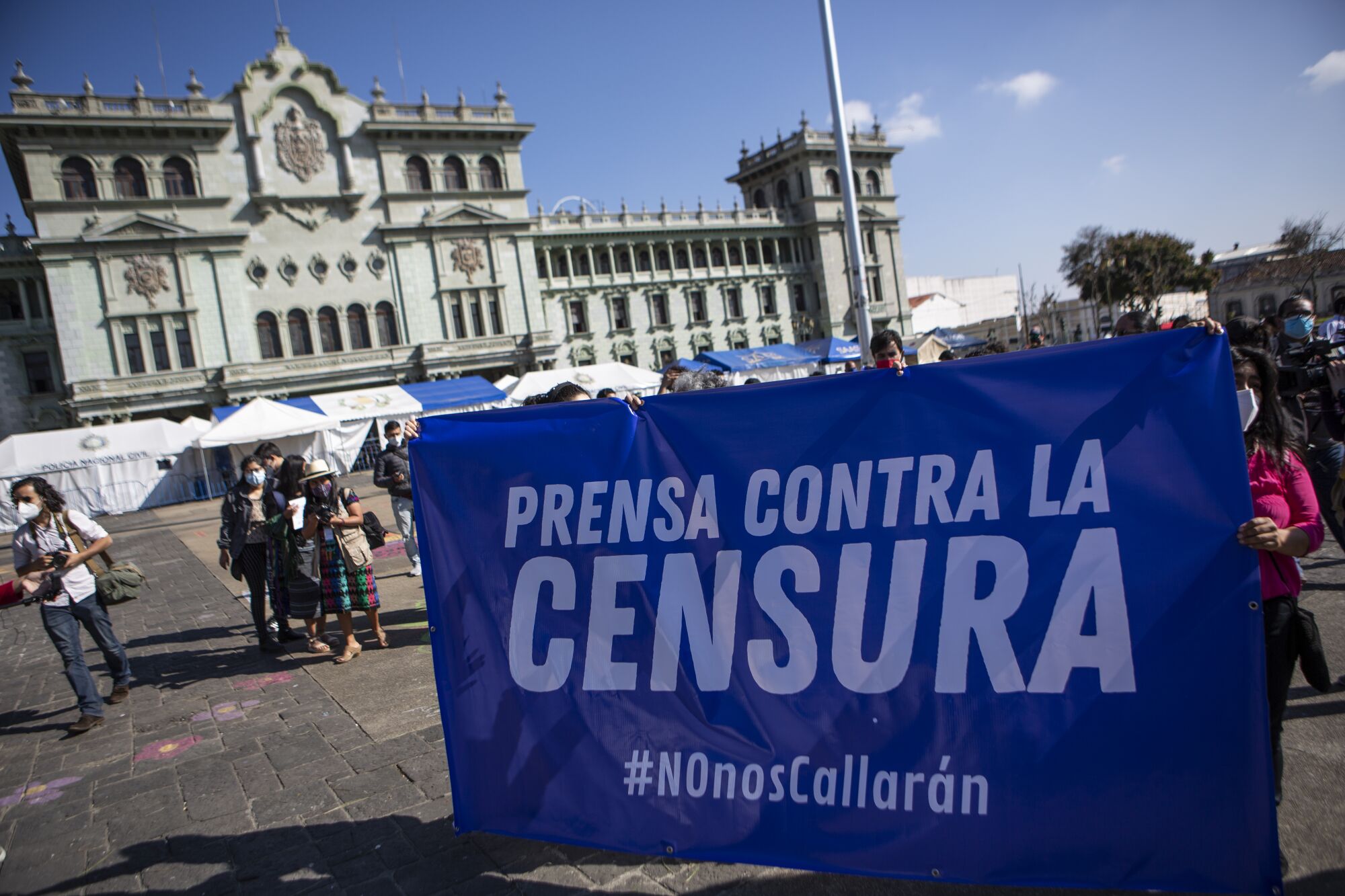 Demonstrators stage a protest in support of journalist Ruben Zamora and press freedoms