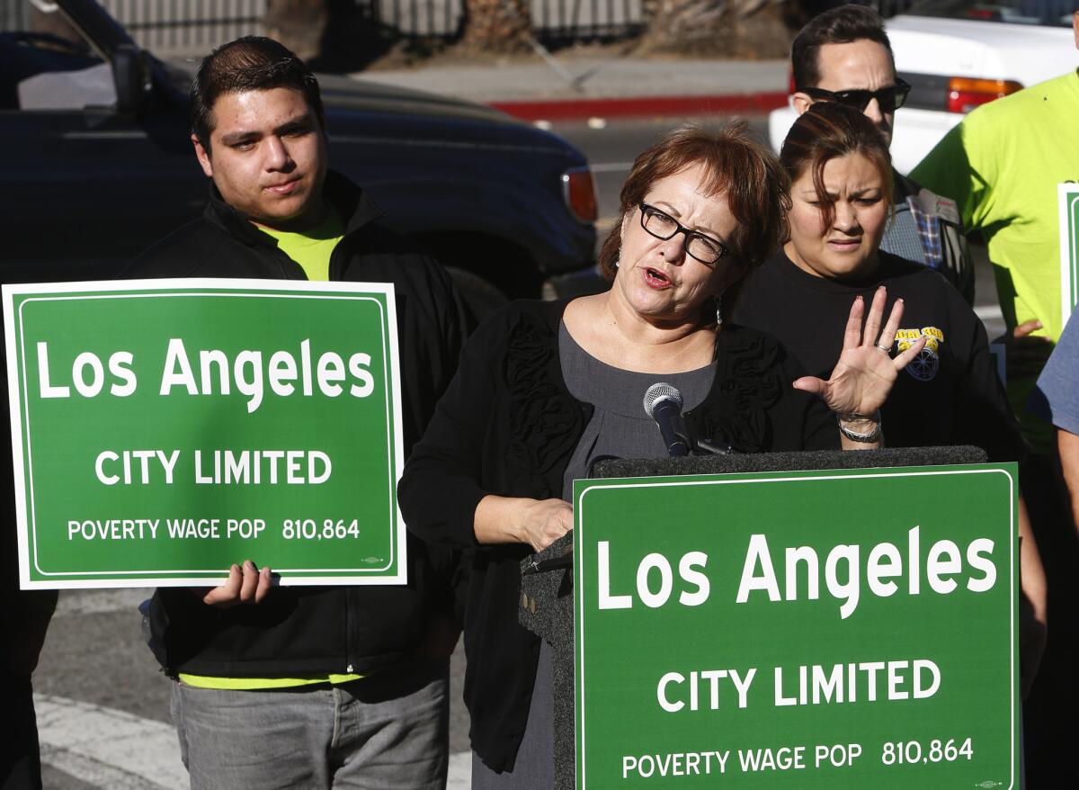 Maria Elena Durazo of the Los Angeles County Federation of Labor speaks at a news conference about a study that found that 46% of wage and salary workers in the city of L.A. make less than $15 an hour.