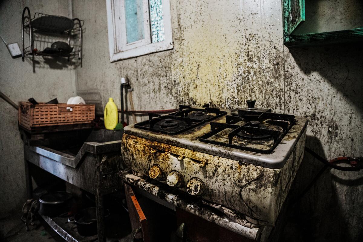 The kitchen inside the makeshift housing on a farm.