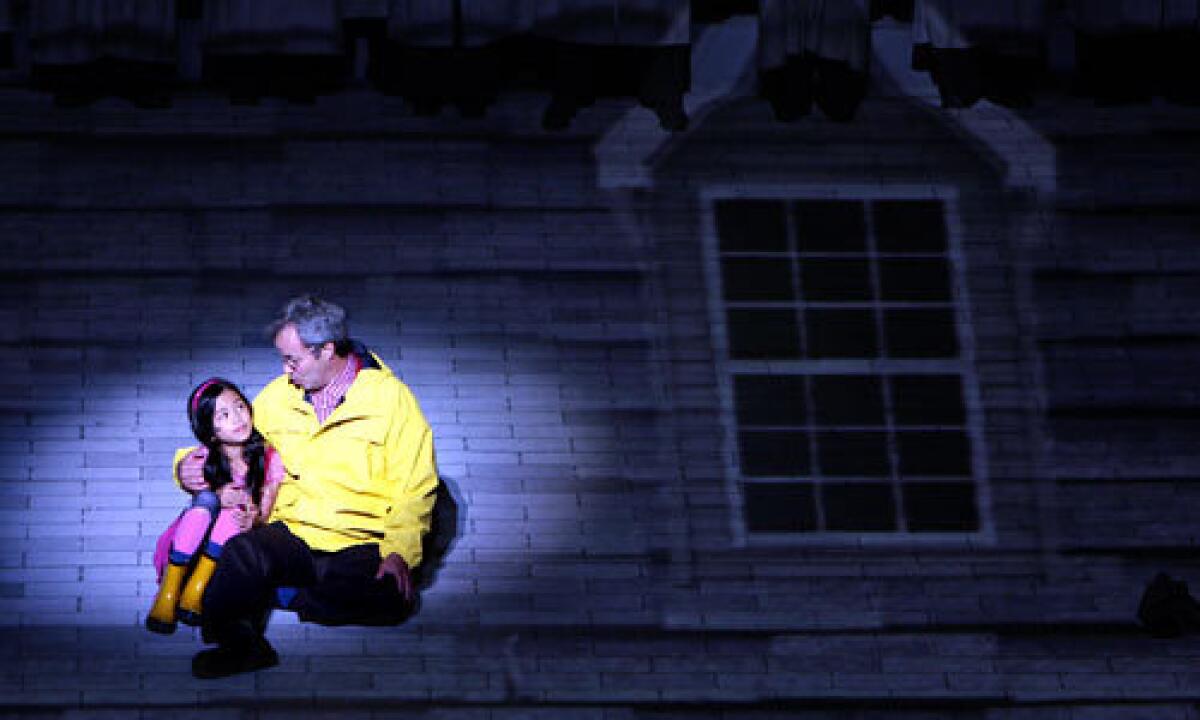 Philip Casnoff and Tiffany Espensen, part of the cast of "Norman's Ark," perform during a preview show at the Ford Amphitheatre.