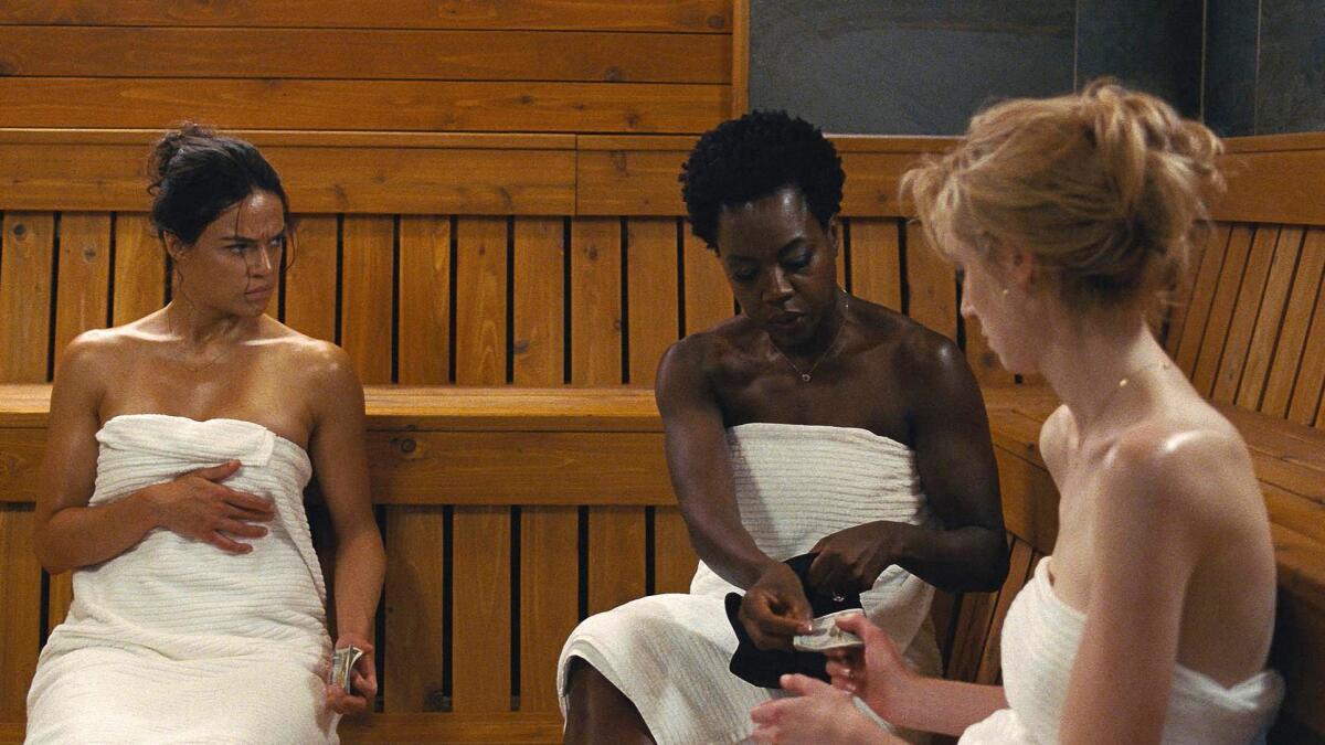 Michelle Rodriguez, Viola Davis, and Elizabeth Debicki in "Widows."