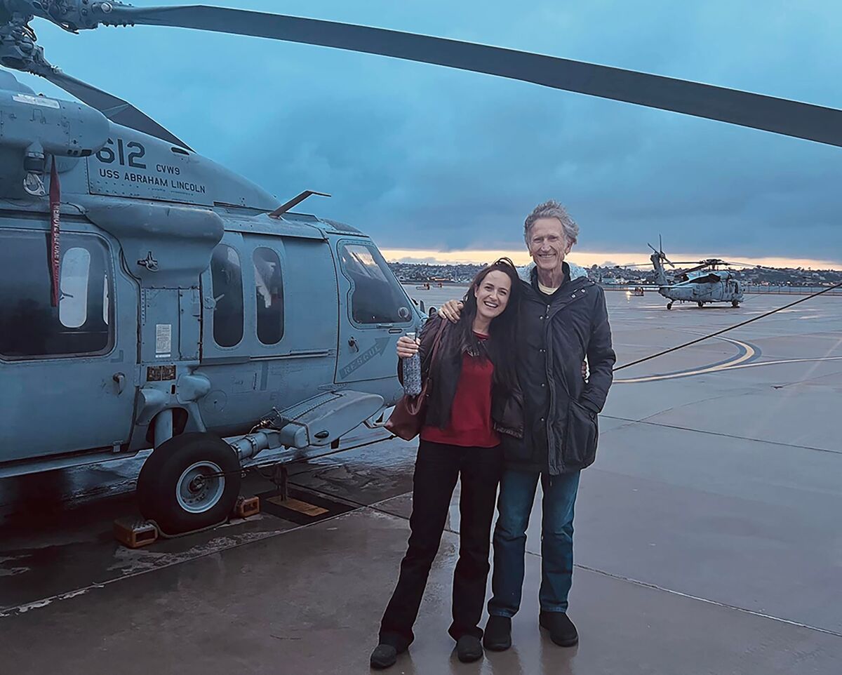 Vanessa Mitchell-Delmotte and her father, Patrick Mitchell, at Naval Air Station North Island in Coronado on Dec. 9.