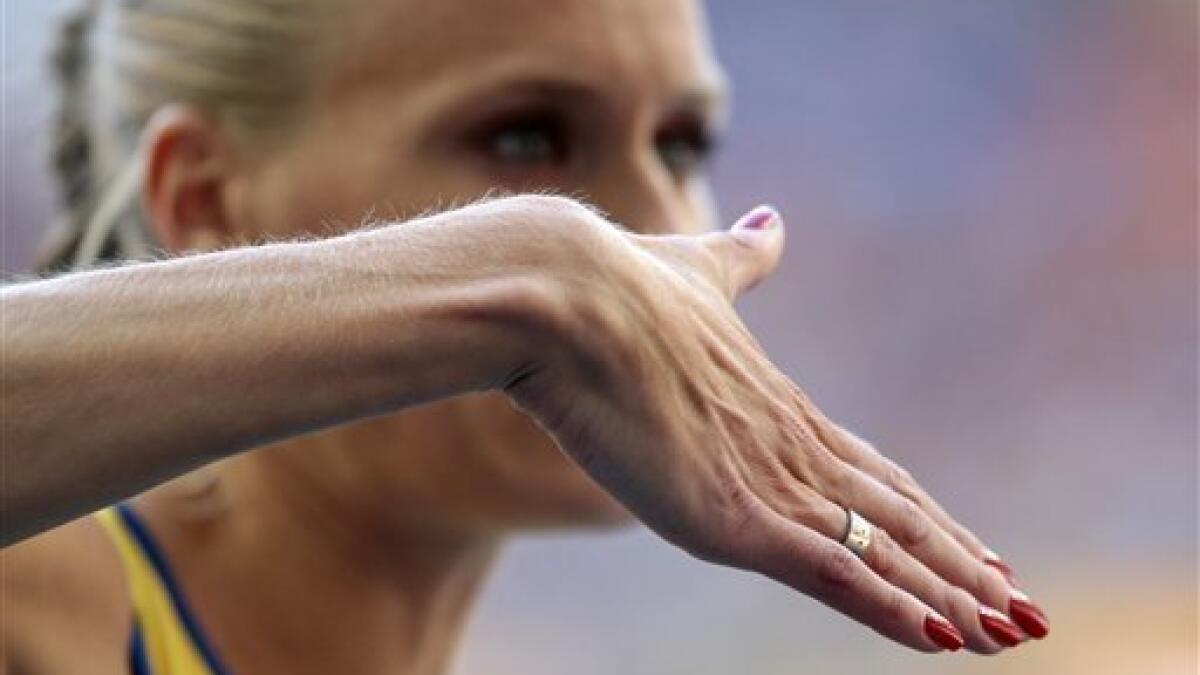 End Of The Rainbow: Swedish Athlete Repaints Nails Red : The Two