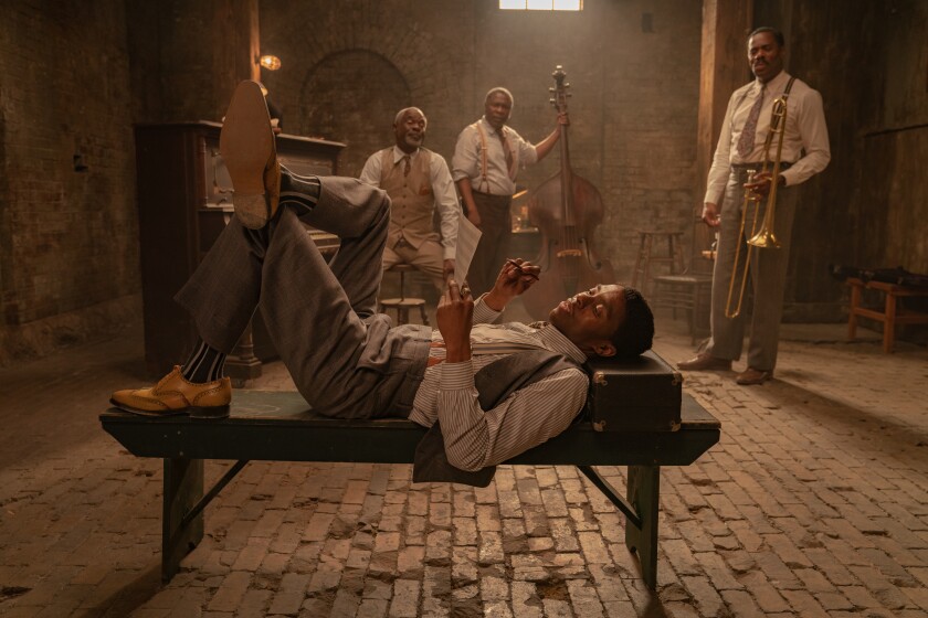 Chadwick Boseman, front, Glynn Turman, Michael Potts and Colman Domingo appear in a scene from 'Ma Rainey's Black Bottom.'