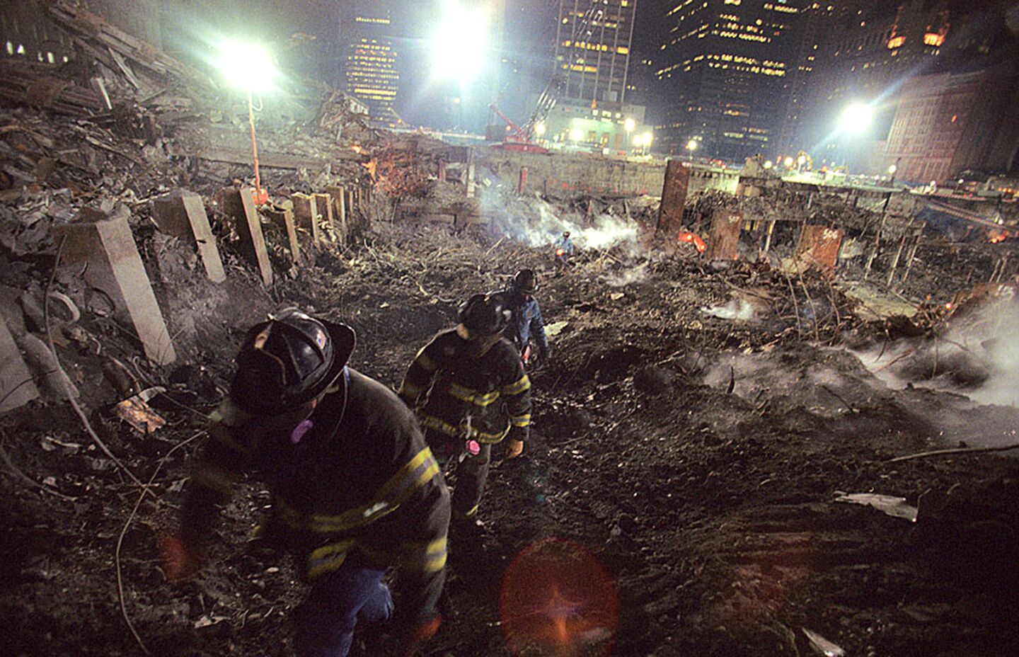 A search team scours the World Trade Center site after the 9/11 terror attacks.