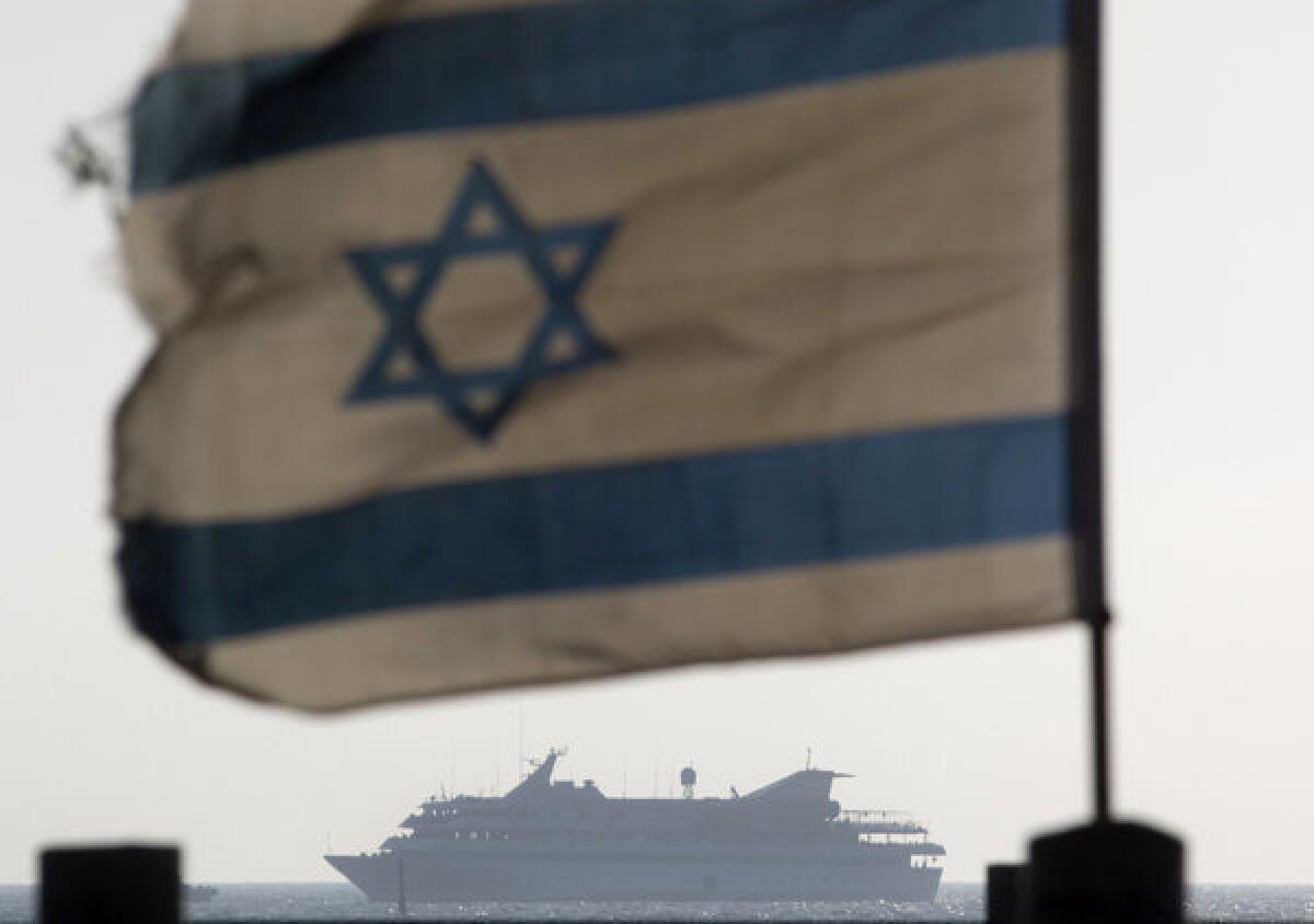 The Mavi Marmara, the lead boat of a flotilla headed to the Gaza Strip, heads for the port of Ashdod, Israel, in May 2010 after being stormed by Israeli commandos in a predawn confrontation.
