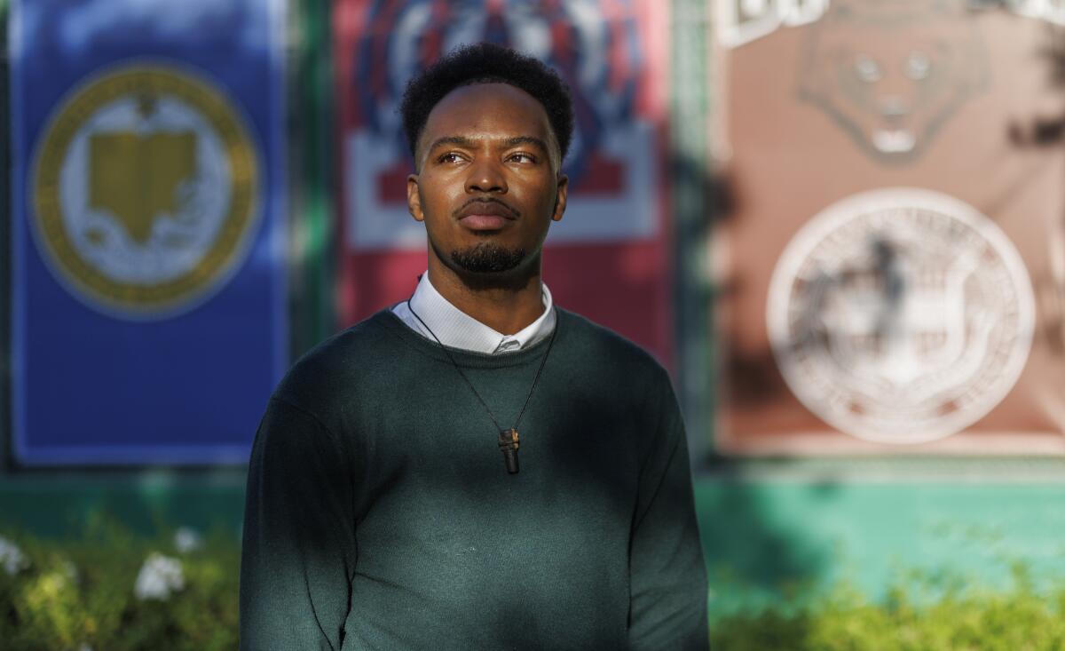 Venice High School teacher Bryant Odega poses outdoors.