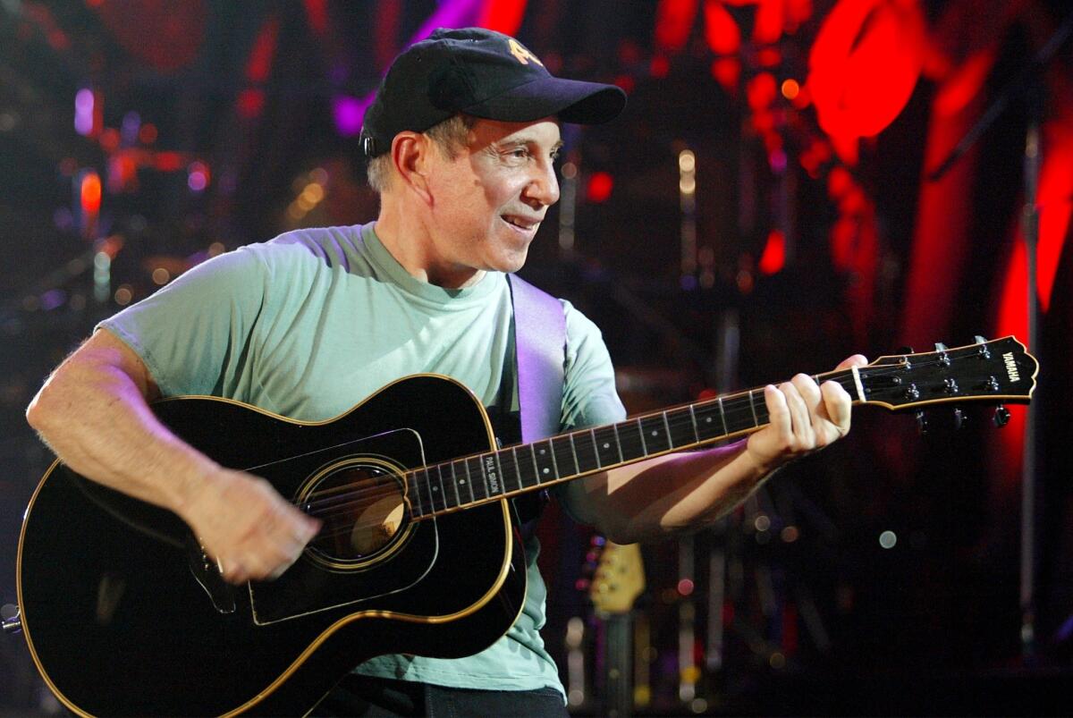 Paul Simon is cooperating on a new biography.
