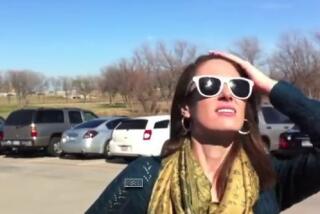 A woman reacts to hearing a strange noise coming from the sky in Texas.