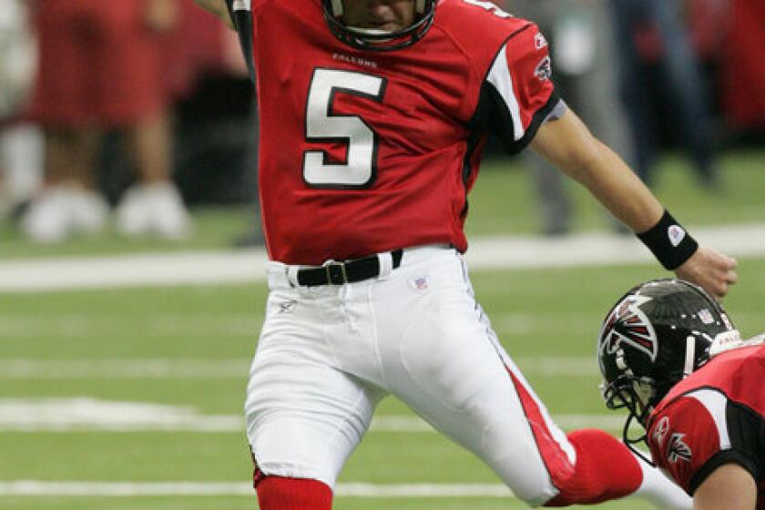 Atlanta Falcons kicker Morten Anderson kicks a field goal in 2006. The longtime placekicker is one of 64 kickers and punters to file workers' comp claims in California alleging head or brain trauma. (AP Photo/Ric Feld)