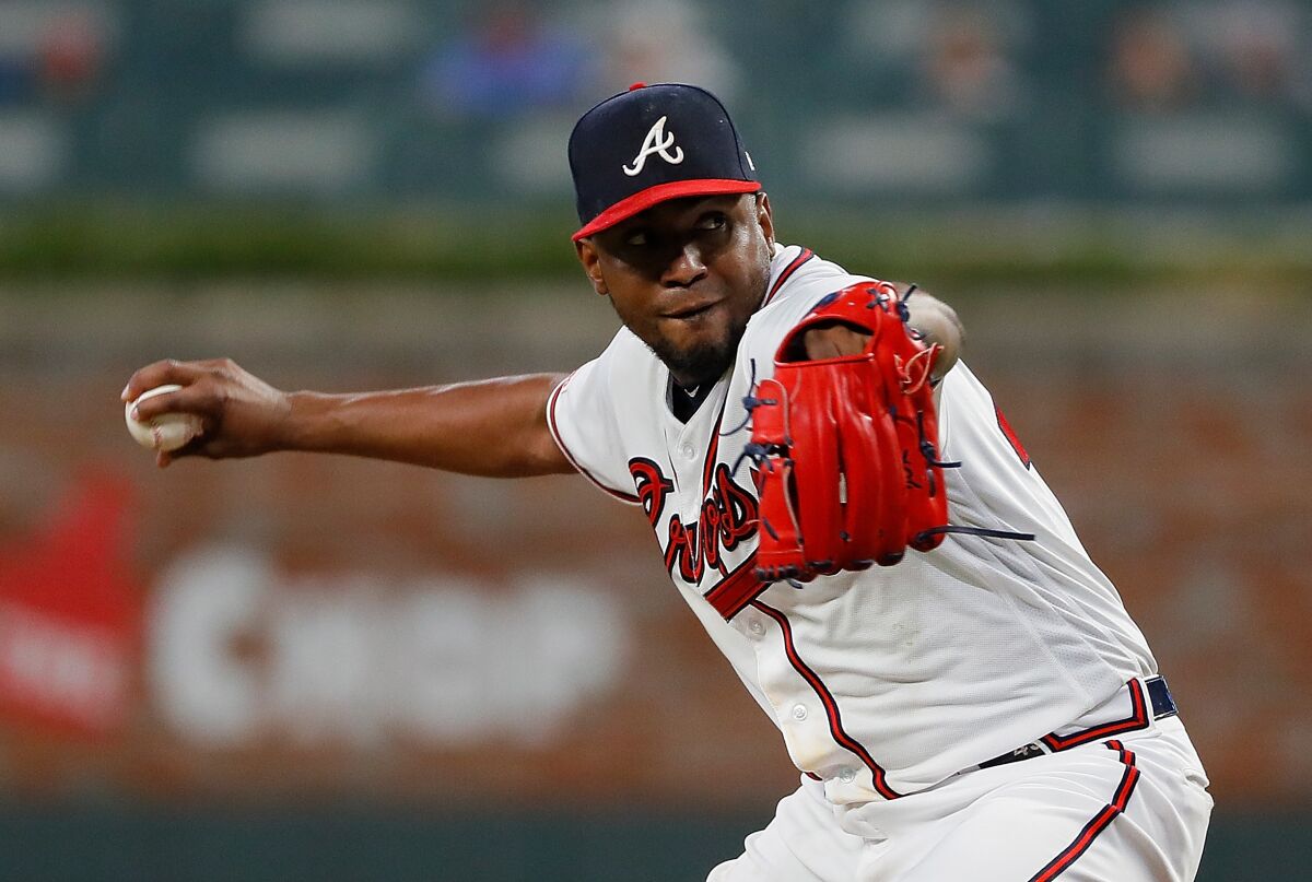 Julio Teheran broke into the majors with the Braves and was in their rotation for seven seasons.
