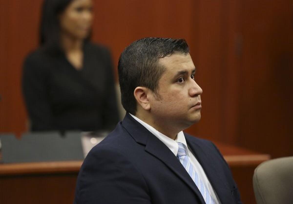 George Zimmerman, charged with second-degree murder in the 2012 shooting death of 17-year-old Trayvon Martin, looks at the potential jurors during his trial.