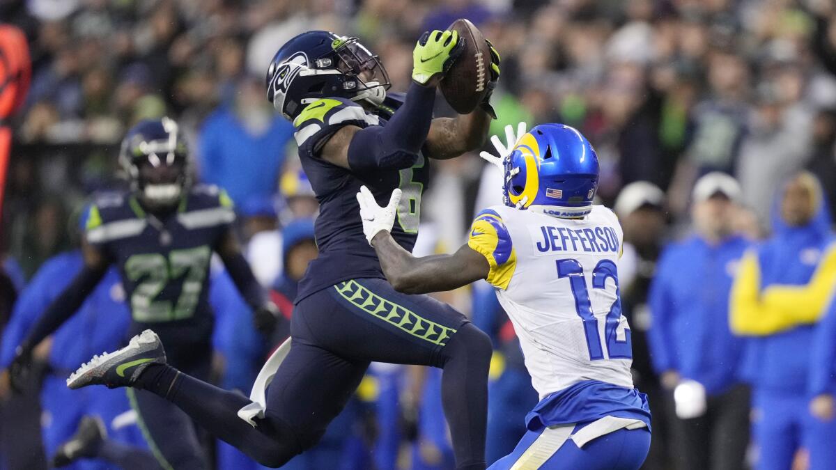 Seahawks win dramatic 19-16 overtime game over Rams, clinch