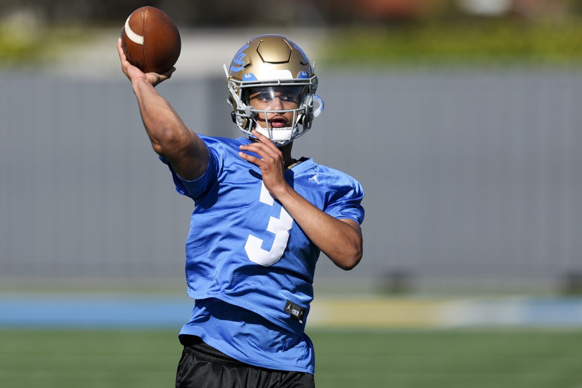 UCLA quarterback Dante Moore throws during a recent practice session.