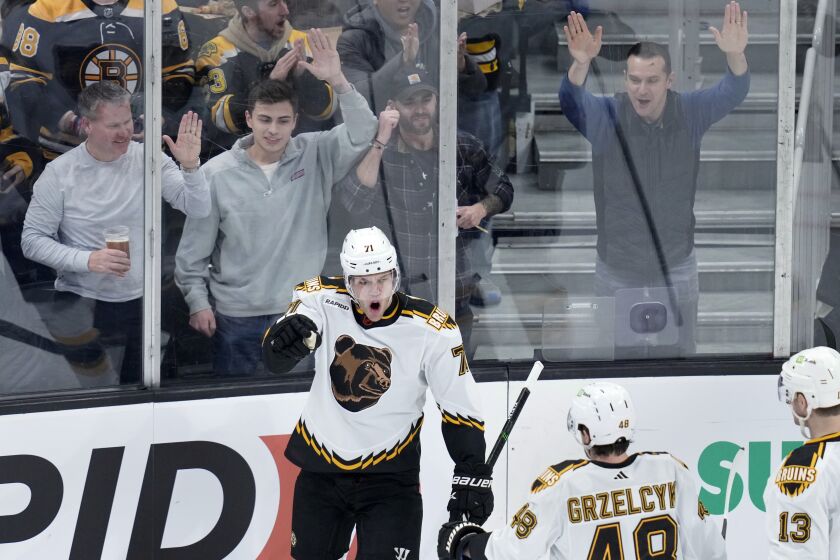 Boston Bruins left wing Taylor Hall (71) celebrates after his goal against the Tampa Bay Lightning during the first period of an NHL hockey game Tuesday, Nov. 29, 2022, in Boston. (AP Photo/Charles Krupa)