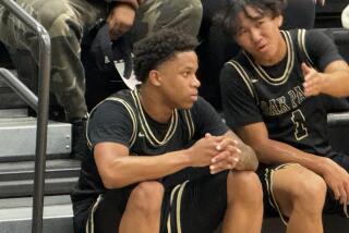 Seshsha Henderson of Oak Park takes a breather. He made eight threes and scored 31 points in loss to Heritage Christian.