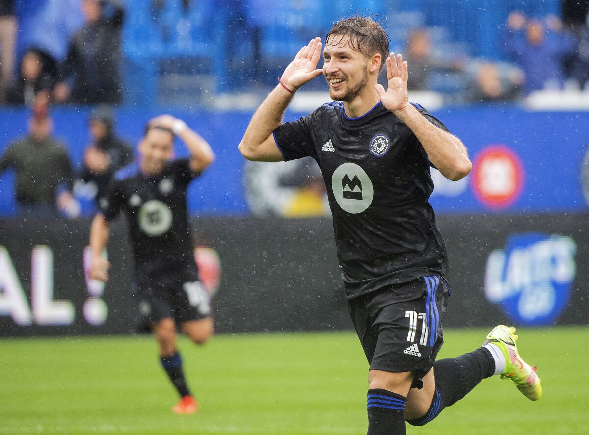 CF Montreal's Matko Miljevic reacts after scoring against Philadelphia Union during the first half of an MLS soccer game, Saturday, Oct. 16, 2021, in Montreal. (Graham Hughes/The Canadian Press via AP)