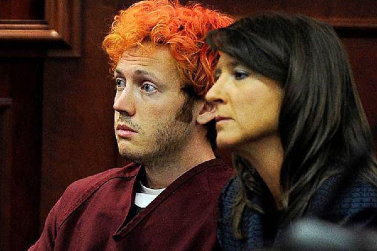 James Holmes appears with defense attorney Tamara Brady before Arapahoe County District Court Judge William B. Sylvester in Centennial, Colo.