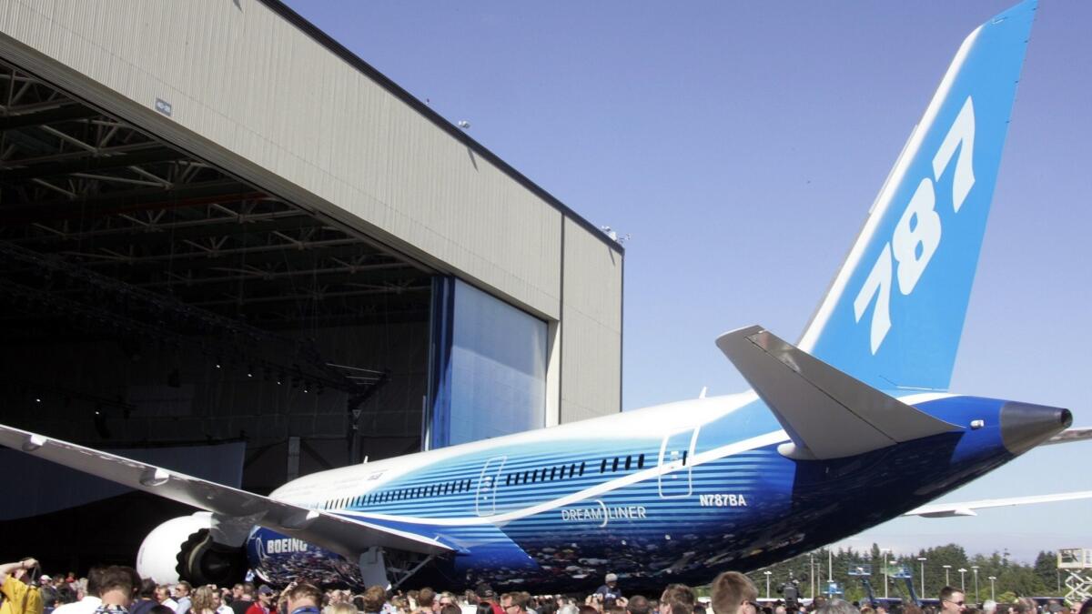 The Boeing 787 Dreamliner is unveiled during its world premiere in Everett, Wash., in 2009.