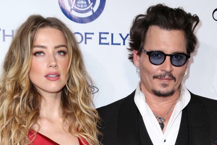 Amber Heard and Johnny Depp are seen together in January 2016.