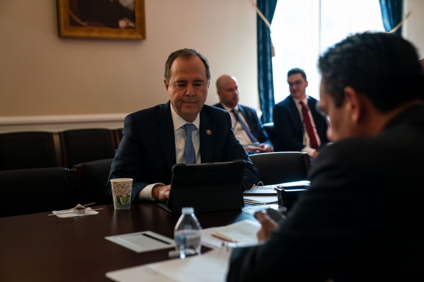 WASHINGTON, DC - JULY 27: Rep. Adam Schiff (D-CA) and members of the House select committee investigating the deadly pro-Trump invasion of the U.S. Capitol meet in a room ahead of the first hearing in the Cannon House Office Building on Capitol Hill on Tuesday, July 27, 2021 in Washington, DC. During its first hearing, the committee - which currently made up of seven Democrats and two Republicans - will hear testimony from law enforcement officers about their experiences while defending the Capitol on January 6. (Kent Nishimura / Los Angeles Times)