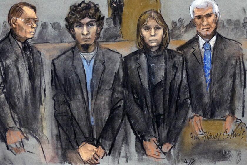 A courtroom sketch from March shows Dzhokhar Tsarnaev, second from left, with defense attorneys, from left, William Fick, Judy Clarke and David Bruck.