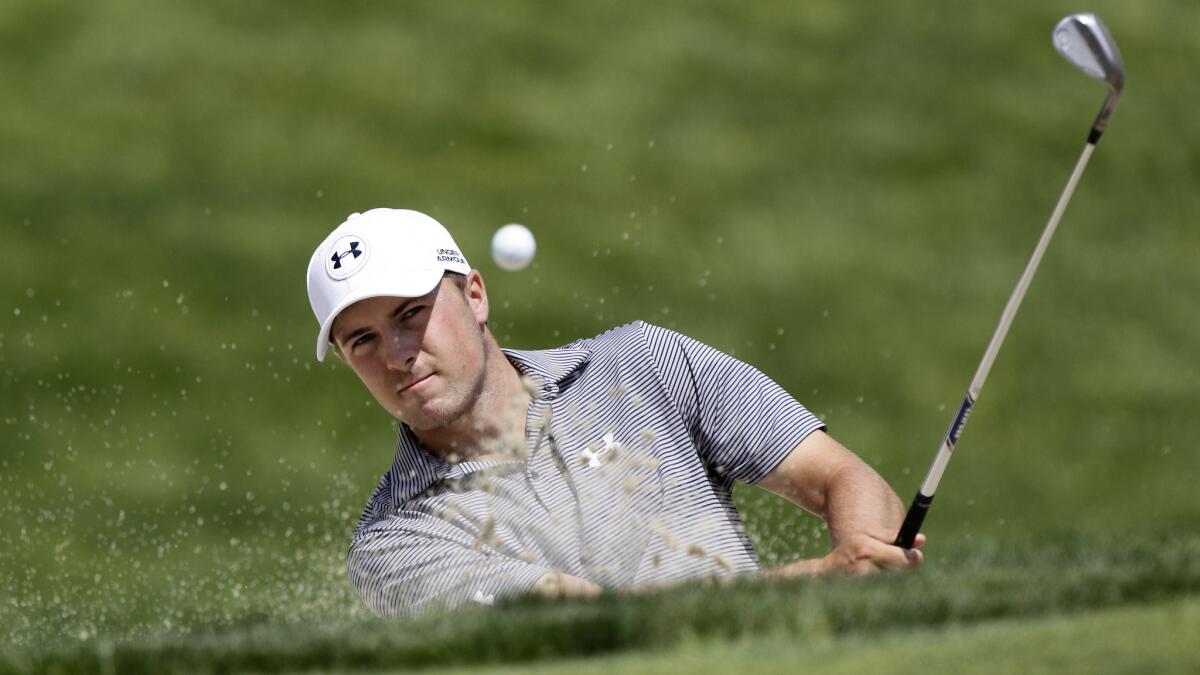 Jordan Spieth hits out of a bunker on the seventh hole at the Memorial golf tournament in Dublin, Ohio, on May 29. Spieth is expected to content for the U.S. Open title this weekend.