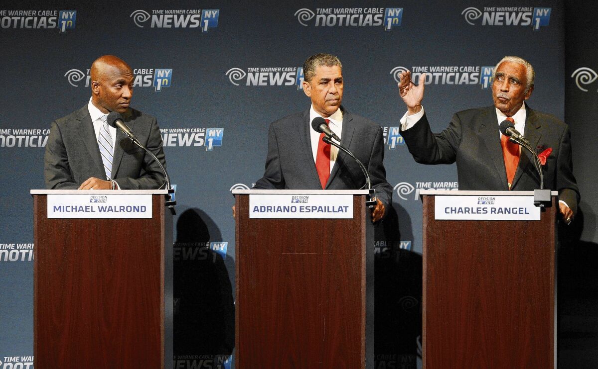 Rep. Charles Rangel, right, gestures during a debate with state Sen. Adriano Espaillat, center, and the Rev. Michael Waldrond Jr. Polls show Rangel leading Espaillat by several points and both far ahead of Walrond.