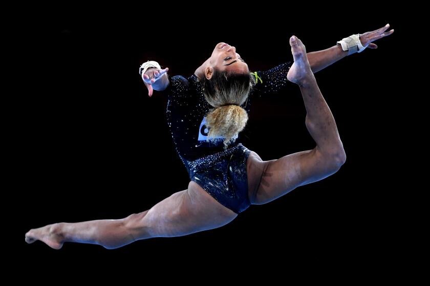STUTTGART, GERMANY - OCTOBER 04: Danusia Francis of Jamiaca performs her floor routine during qualification during Day One of the FIG Artistic Gymnastics Championships on October 04, 2019 in Stuttgart, Germany. (Photo by Laurence Griffiths/Getty Images)