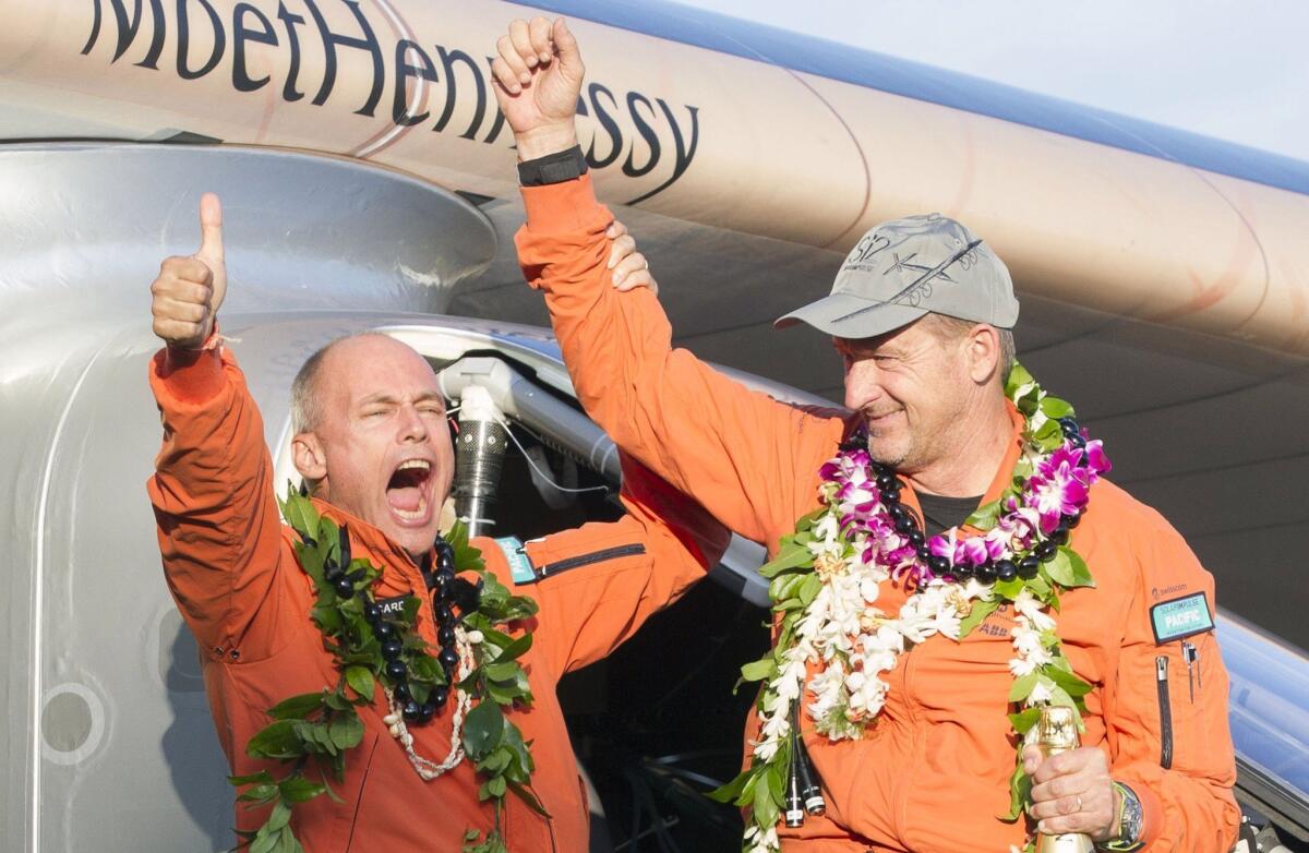 Solar Impulse 2 pilots Bertrand Piccard, left, and Andre Borschberg reflect on the first leg of their trans-Pacific flight.