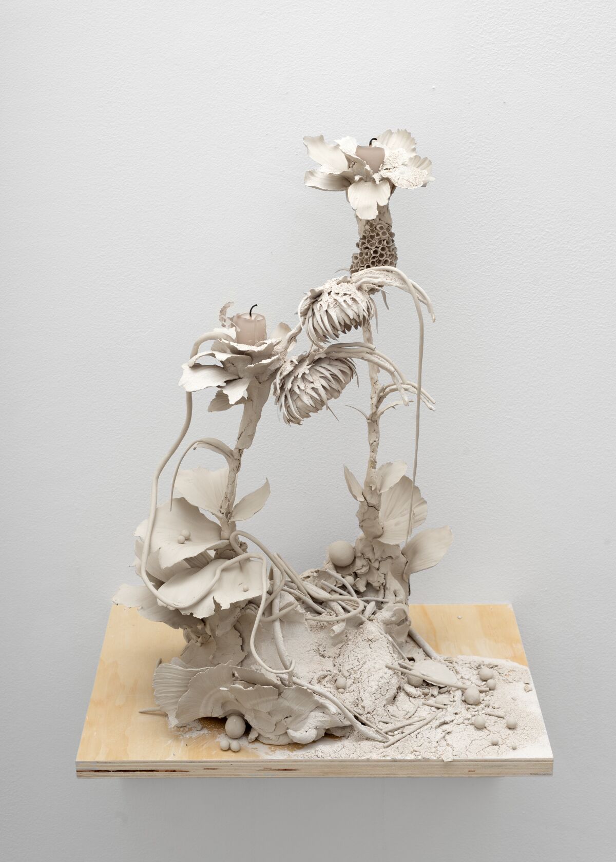 A raw clay sculpture, in Phoebe Cummings' "Cut," conveys the ephemerality of life.