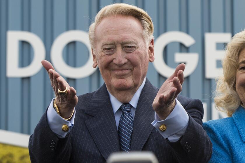 FILE - In this Monday, April 11, 2016, file photo, Los Angeles Dodgers legend Vin Scully.