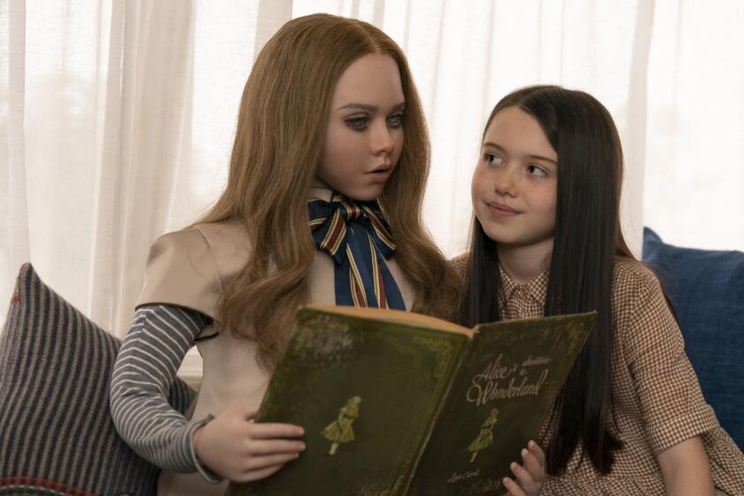 spookiness crossword A female robot reas a book to a young girl in the movie "M3GAN."