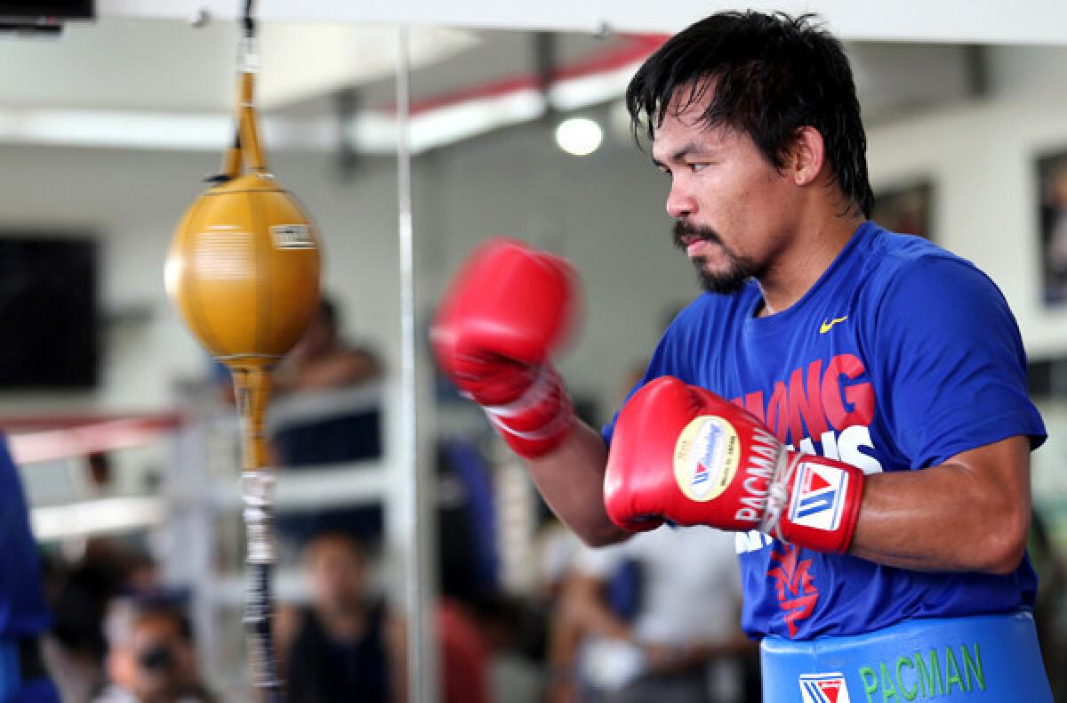 Manny Pacquiao works with the speed bag during a training session earlier this month in General Santos City, Philippines.