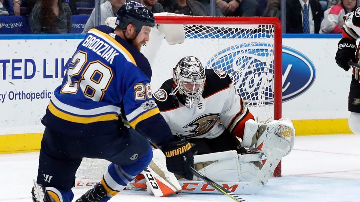 St. Louis Blues' Kyle Brodziak (28) is unable to get off a shot as Ducks goalie John Gibson defends during the second period on Wednesday in St. Louis.