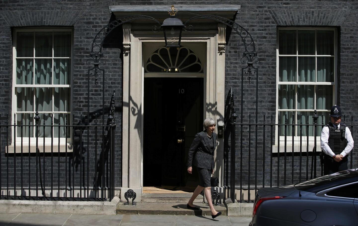 Britain's Prime Minister Theresa May leaves 10 Downing Street in central London on May 25, 2017. May said she would raise the issue of leaks from a probe into the Manchester terror attack that have infuriated British authorities with their U.S. counterparts ahead of her departure for a NATO summit in Brussels.