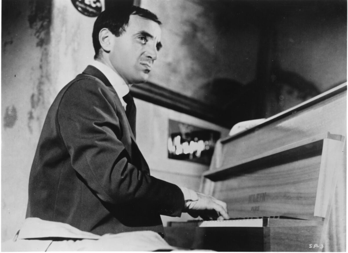 Charles Aznavour in Francois Truffaut's 1960 film "Shoot the Piano Player," based on David Goodis' 1956 novel "Down There."