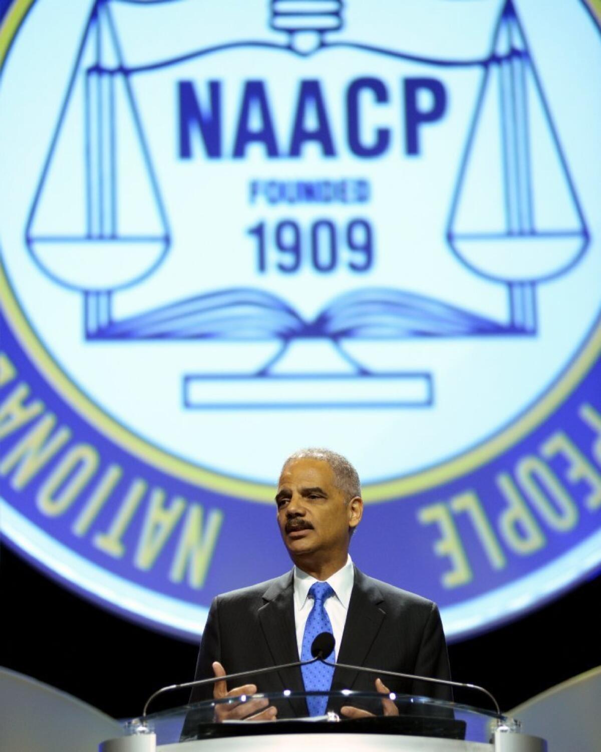Atty. Gen. Eric H. Holder Jr. speaks to the National Convention of the NAACP on Tuesday in Orlando, Fla. Holder condemned "stand your ground" laws and discussed the George Zimmerman not-guilty verdict in the shooting death of Trayvon Martin.