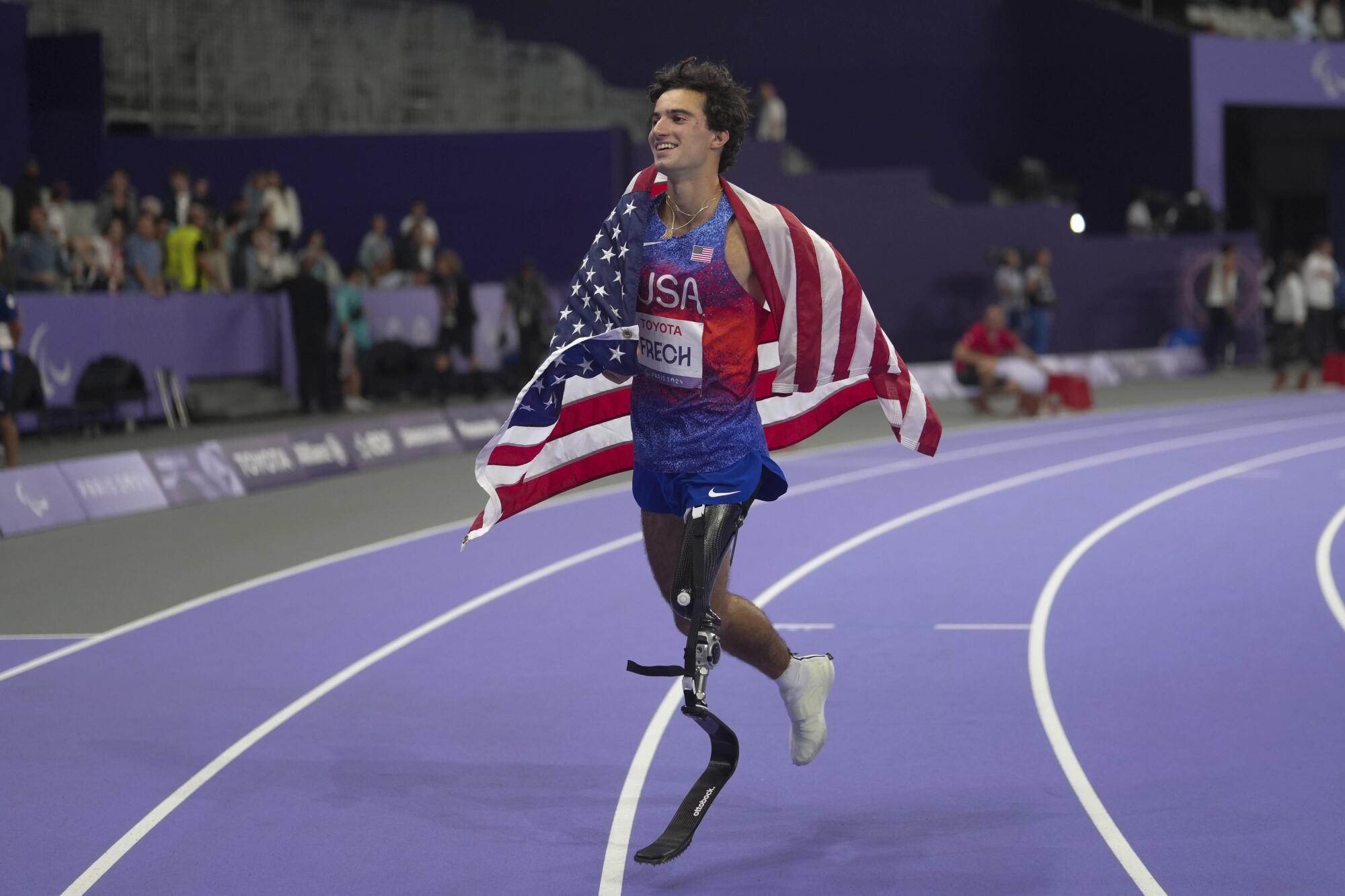 American Ezra Frech celebrates after winning the men's high jump T63 final during the 2024 Paralympics Tuesday in Paris.