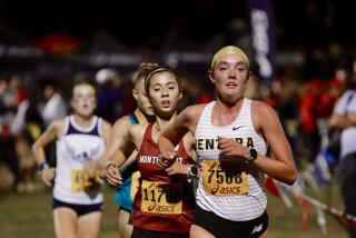 Ventura's Sadie Engelhardt moves into third place with a mile to go in the Woodbridge Classic girls sweepstakes race Saturday