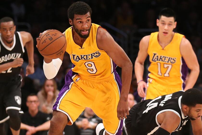 Lakers guard Ronnie Price drives to the basket during a loss to the Brooklyn Nets on Feb. 20.