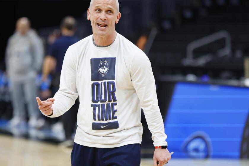Boston, MA- March 27: UConn coach Dan Hurley cheers on his team on during a practice for a Sweet 16 game against San Diego State at the TD Garden on Wednesday, March 27, 2024 in Boston, MA. (K.C. Alfred / The San Diego Union-Tribune)