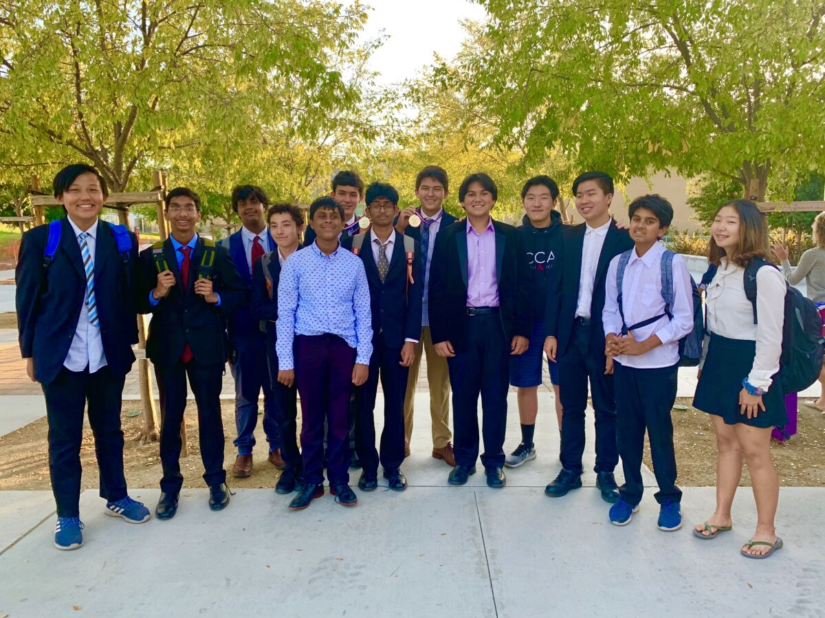 CCA Speech & Debate Team members (l-r): Andrew Zhang, Yash Gupta, Aditya Hegde, Ethan Gross, Razeen Nasar, Alex Tahan, Hershey Chava, Eric Chang, Danny An, Debate Club President Justin Liu, Benjamin Peng, Ishan Deshpande and Hailey Cho.