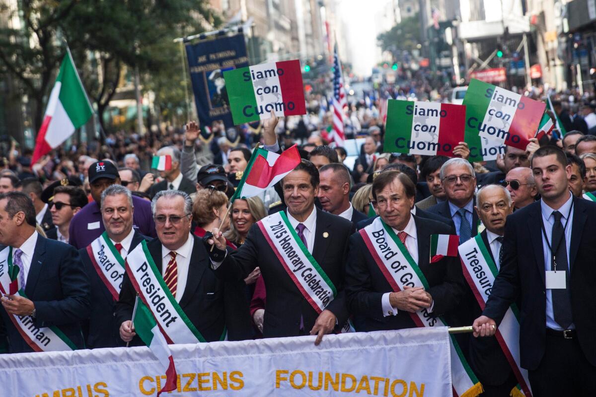 New York Governor Andrew Cuomo (center) participates in the Columbus Day Parade on Fifth Avenue on October 12, 2015 in New York City.