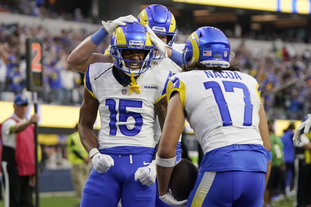 Rams receiver Demarcus Robinson (15) celebrates his touchdown catch against the Browns with Puka Nacua (17).