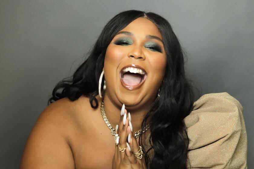 Lizzo changes 'Grrrls' lyric after backlash about 'ableist' slur in song -  National