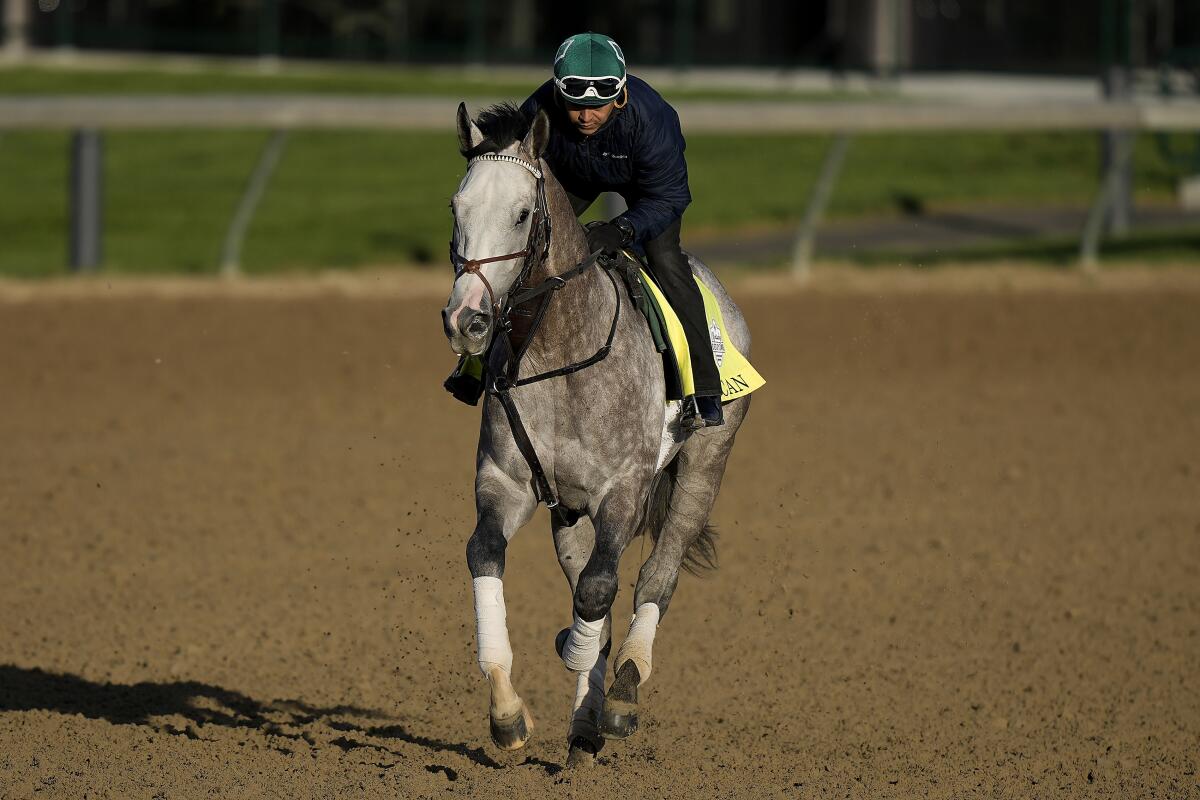 Kentucky Derby entrant Rocket Can works out at Churchill Downs on Tuesday.